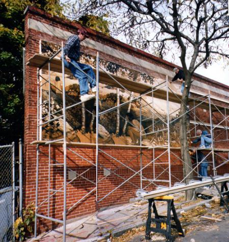 Savin Hill Mural: Packy McDonough and Paul Brancone installed the “Savin Hill 500 Years Ago” mural in November 1999. The mural has recently been restored by artist James Hobin.  Photo courtesy James Hobin